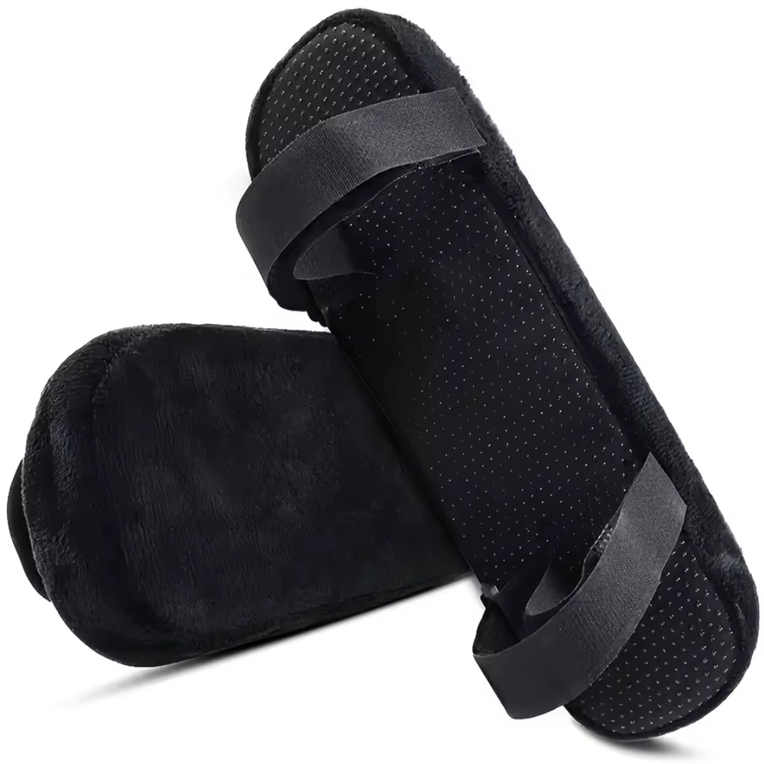 Black armrest pads with non-slip strap attachment, shown top and underside