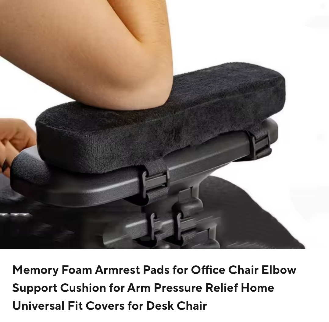 Memory foam armrest pad cushioning a wheelchair armrest under a resting elbow